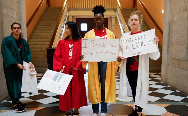 COLUMBUS, Ohio — JUNE 14: (left to right) Students Mel Searle from the University of Cincinnati, Kayli Rego, Brielle Shorter and Brittany Glenn from Ohio State prepare for a protest led by the Ohio Student Association in opposition to Senate Bill 83, June 14, 2023, at the Statehouse in Columbus, Ohio.