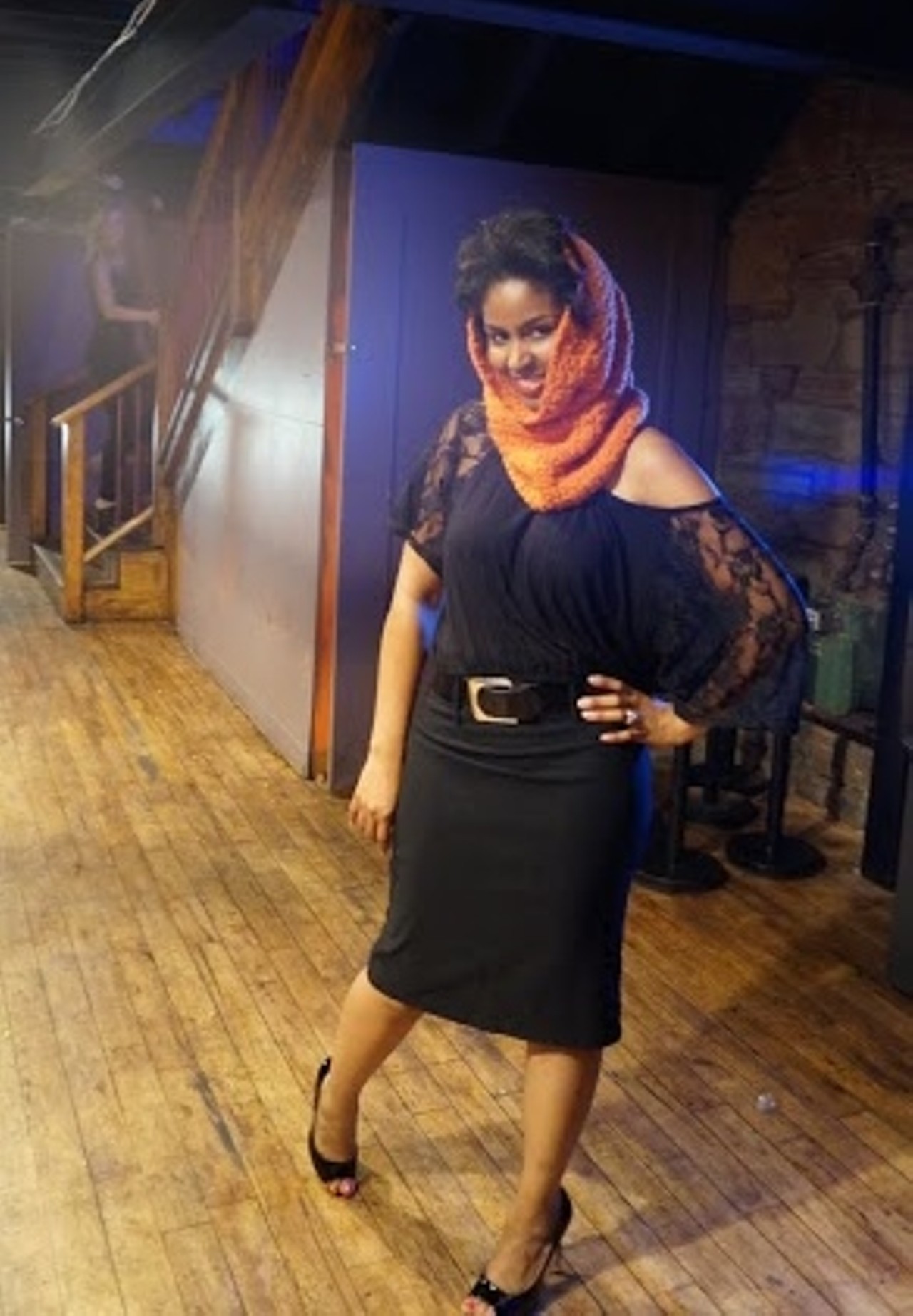 Model backstage wearing a scarf by Tashawna.