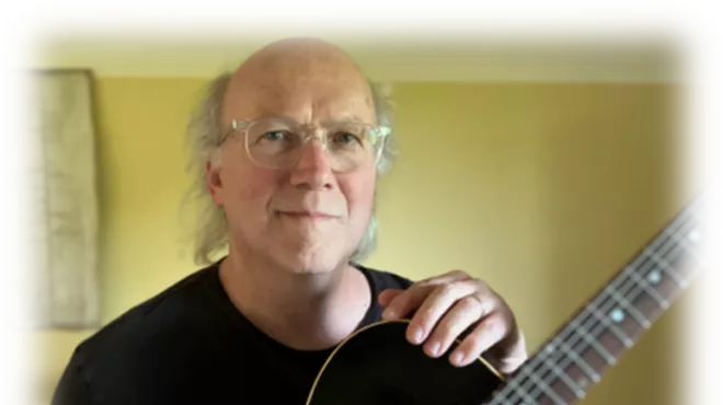 Image: Music in the Garden at Centering Space: Guitarist John Lucic