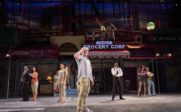 Joseph Morales (center) as Usnavi and the cast of Cleveland Play House's production of IN THE HEIGHTS