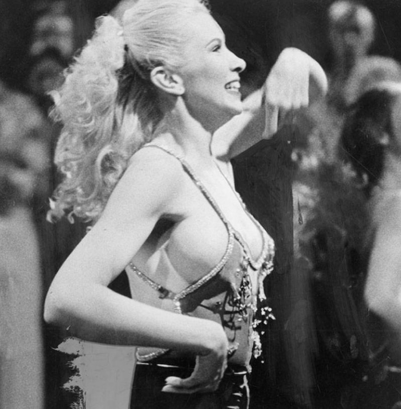 "A member of the professional dance group 'Dance Explosion' gives Weekday Fever viewers a glimpse of a sassy dance step during a guest appearance on the show."  --photo verso.  "Weekday Fever" was an hour-long program which aired Mondays through Fridays on WKYC during the height of the disco phenomenon. 1979