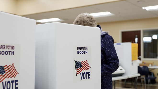 A voter at a ballot maker machine.