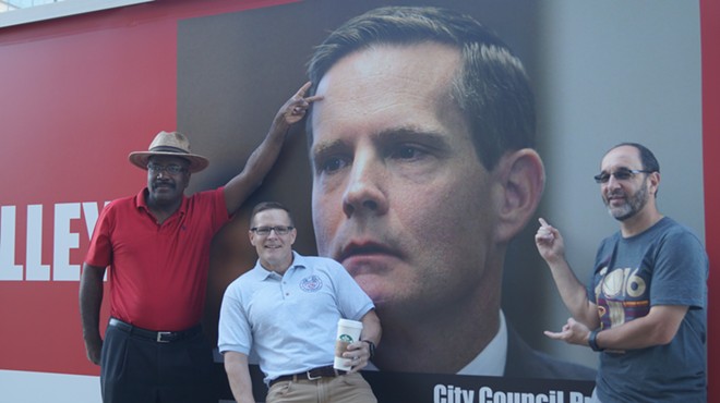 Councilmen Kevin Conwell, Kevin Kelley and Tony Brancatelli mugging in front of an anti-Kelley truck outside City Hall in 2016.