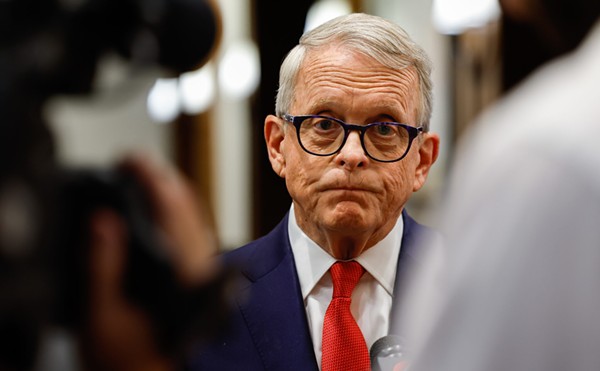 Ohio Governor Mike DeWine talks with the press.