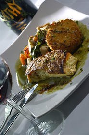 Pan-roasted halibut swims in a seductive m?nge of flavors. - Walter Novak