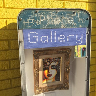 PHOTOS: Cleveland's Smallest Art Gallery is Located Inside an Old Phone Booth