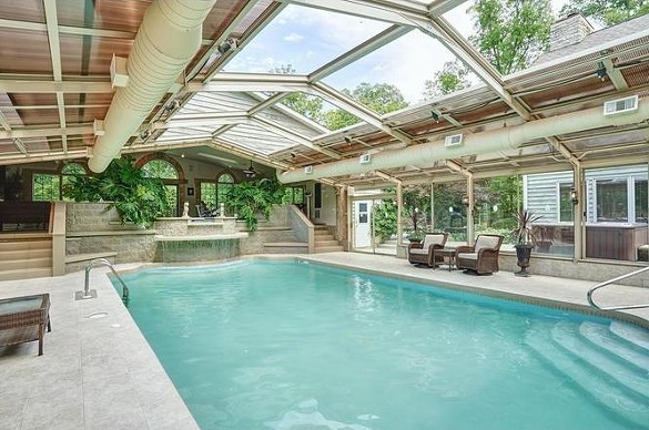Someone Give Us $1.5 Million So We Can Live in This Northeast Ohio Home's Indoor Pool All Winter
