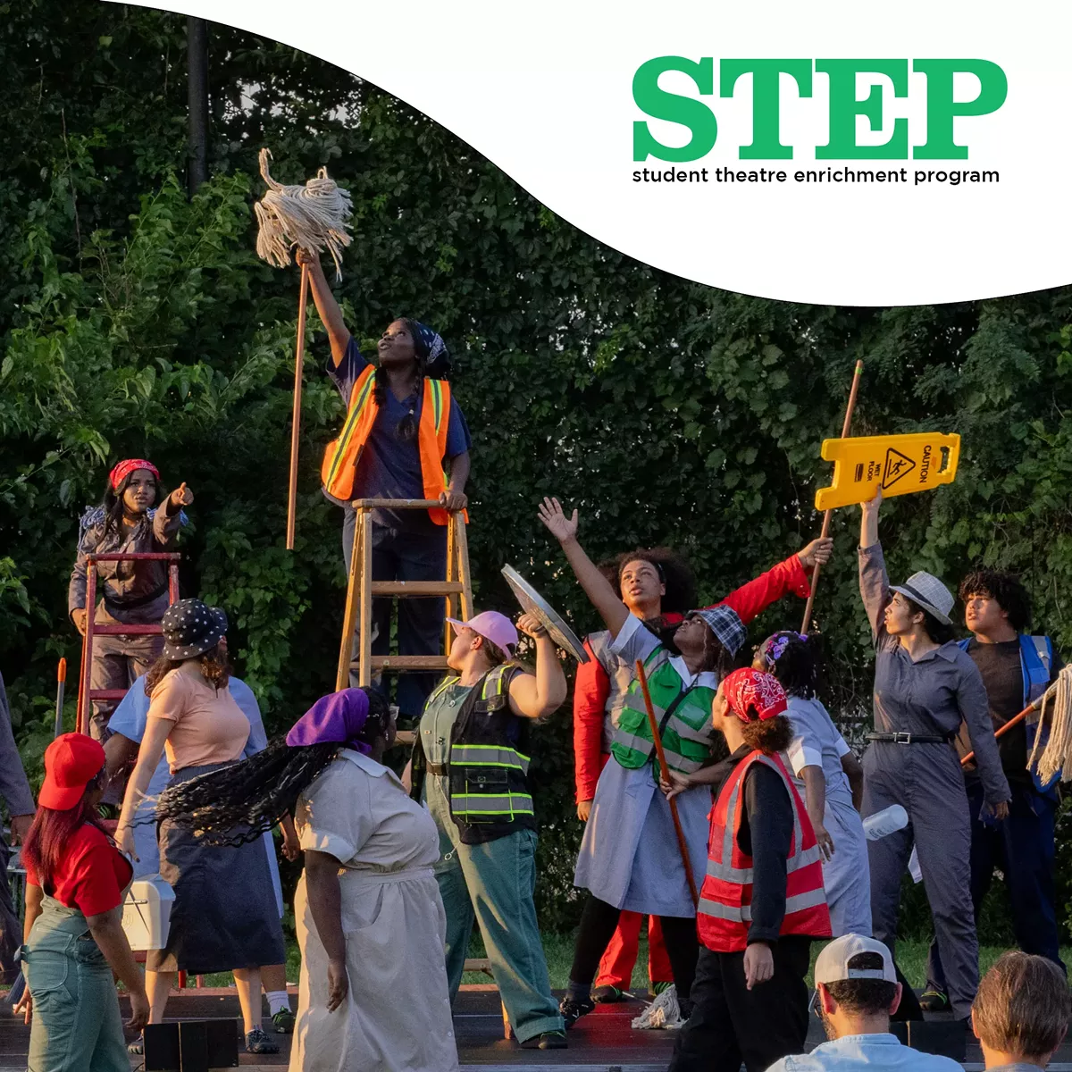 Photo of youth performing in an outdoor park.