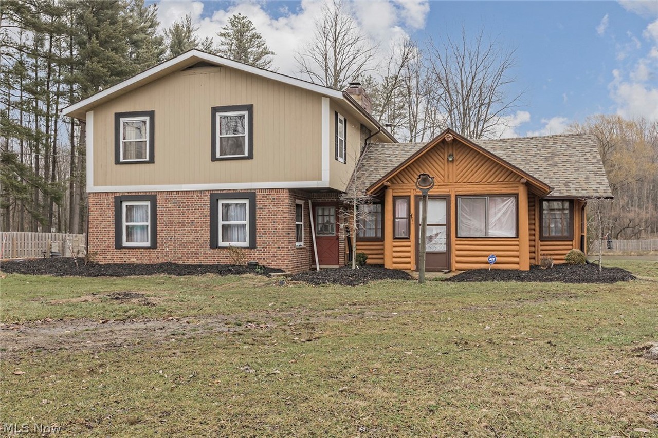 Suburban in Front, Rural Log Cabin in Back, This North Royalton Home is the Mullet House of Real Estate