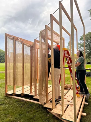 HSB Architect + Engineers employees build a sukkah for the Sukkah Village installation at Wade Oval.
