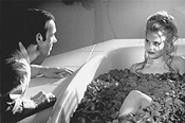 Sweet dreams: Lester (Kevin Spacey, left) draws a bath for Angela (Mena Suvari).