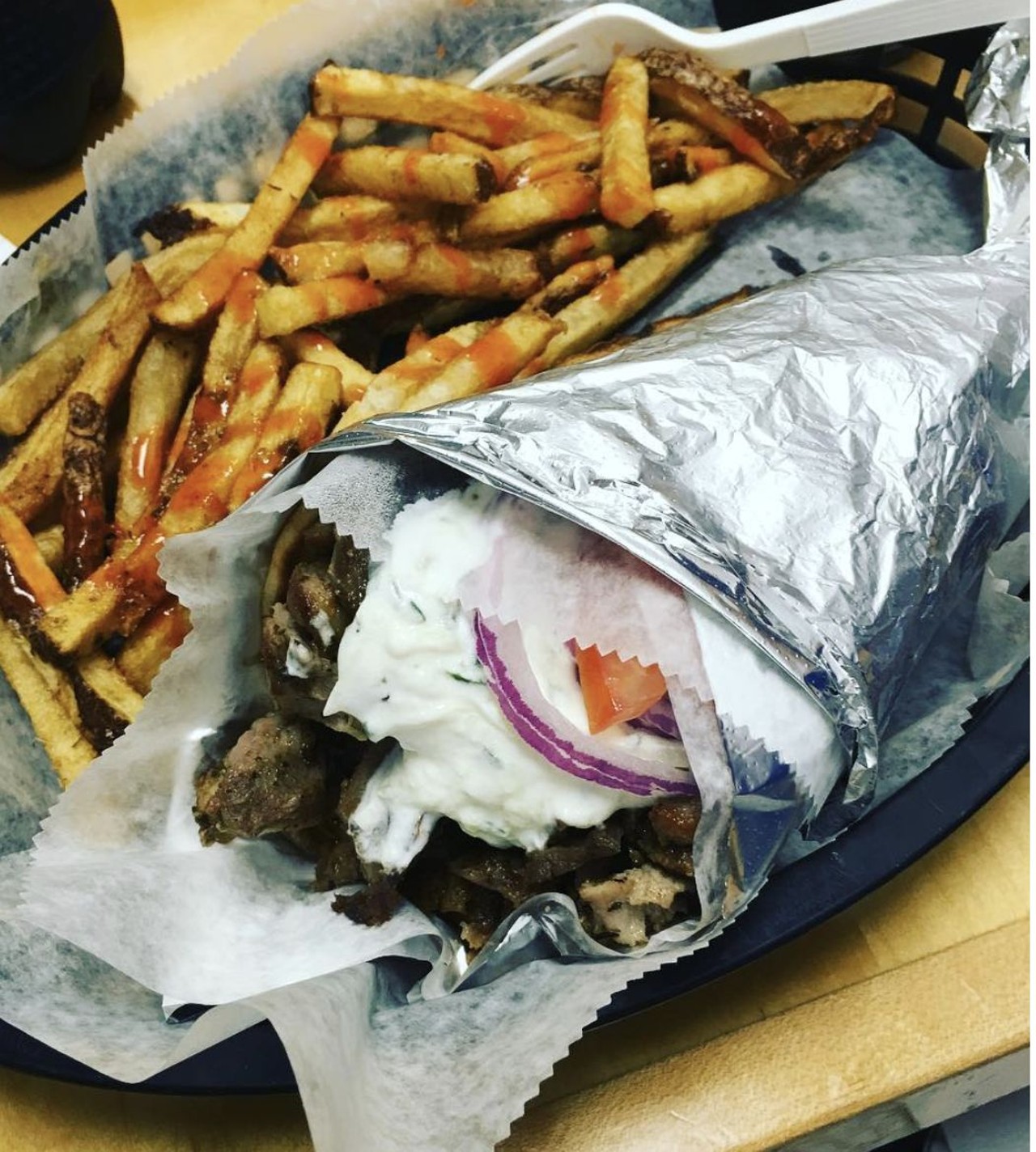  Gyro from Greek Village Grille
Multiple Locations
But in this case, the bread is warm pita, the meat is seasoned lamb and beef, standing in for the veggies are tomatoes and onion, and that sauce is a refreshing yogurt-cucumber blend.
Photo via @SashDDavenport/Instagram