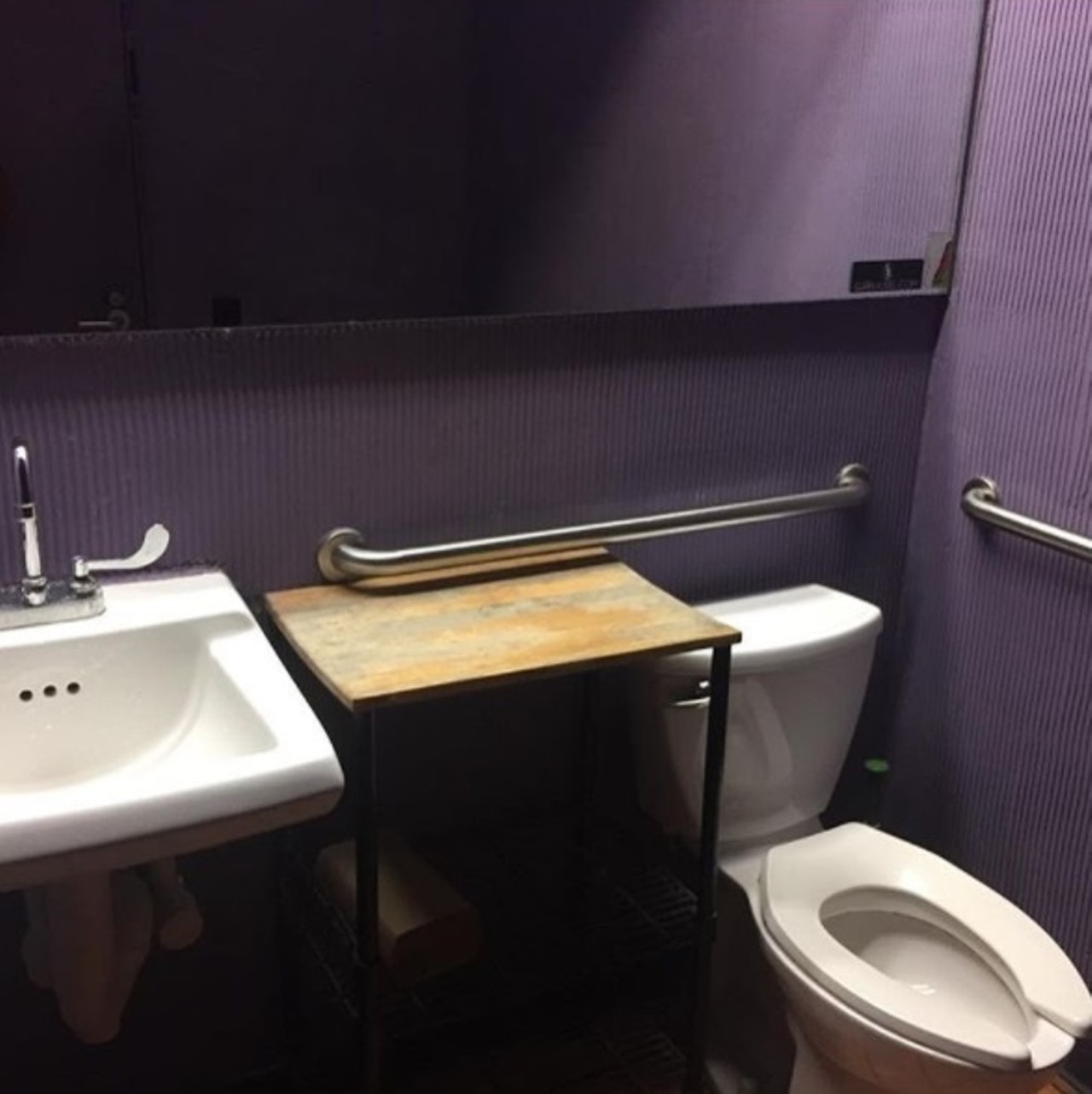 XYZ Tavern
6419 Detroit Ave., 216-706-1104
If you&#146;re in Detroit Shoreway and it&#146;s too far from home, head to XYZ for clean single-stall bathroom. Come on, it's purple, and it will offer you the solace you need. 
Photo via Bathrooms Of Cleveland/Instagram