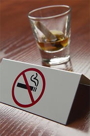 The fine for smoking pot in a bar is now less than for smoking a cig.