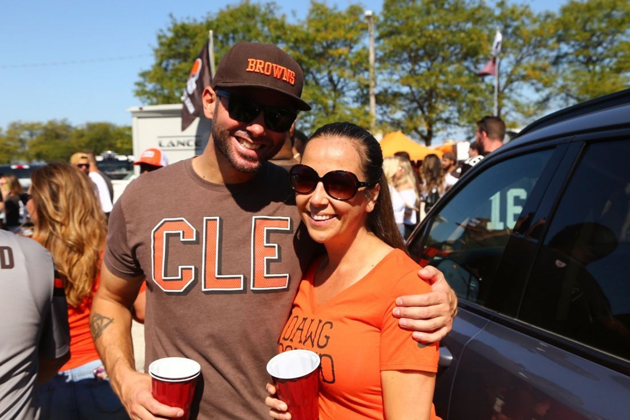 The Muni Lot
Schlepping downtown to a giant parking lot filled with converted trucks and porta potties might not sound like the most romantic thing in the world but in Cleveland it qualifies. Love is swigging White Claw at 9 a.m. out of a plastic cup while barking "Here we go Brownies."
