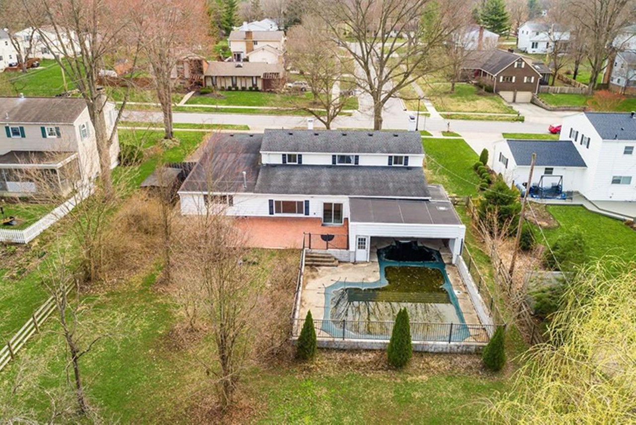 This Ohio Home's Half Indoor/Half Outdoor Pool in a Garage and Ice Cream Bar Landed It on Zillow Gone Wild