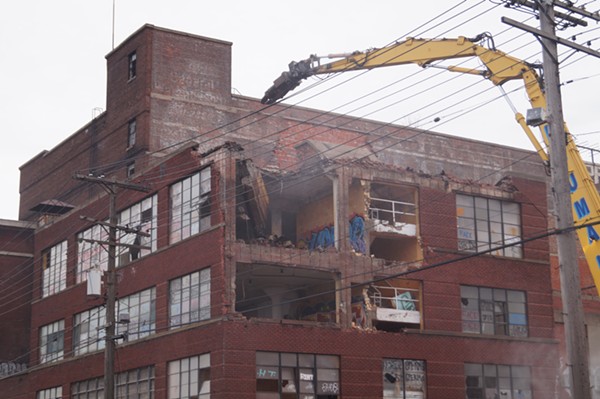Phase one Demolition of Swift & Co. meat packing building (3/20/18). - SAM ALLARD / SCENE