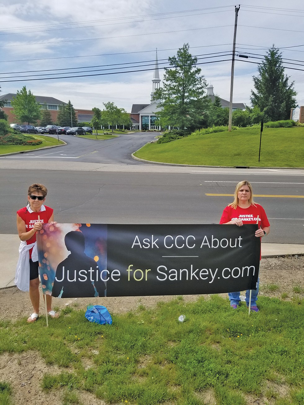 Cari Gintz and Sarah Klingler outside Christ Community Chapel in June. - Photo Courtesy Sarah Klingler