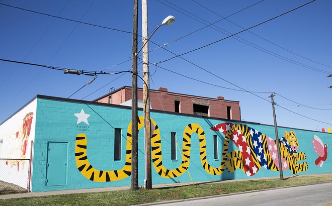 Artist Michela Picchi's colorful "Tiger" mural in Hingetown. - Photo by Kathryn Dike