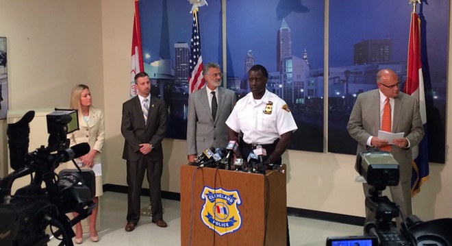 Cleveland police chief Calvin Williams, center, at a press conference - Eric Sandy