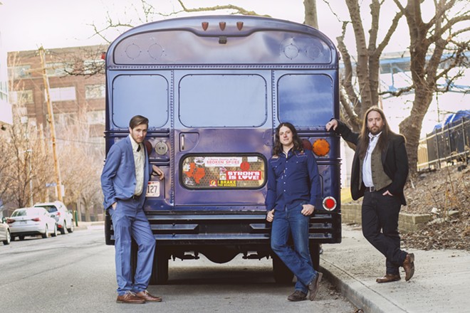 Cory Grinder and the Playboy Scouts and their big blue bus. - CORY GRINDER