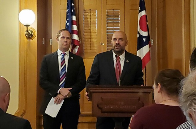 State Reps. Casey Weinstein, D-Hudson, and Jeffrey Crossman, D-Parma, speak at a Thursday news conference. Photo by Tyler Buchanan, OCJ. - Tyler Buchanan/OCJ