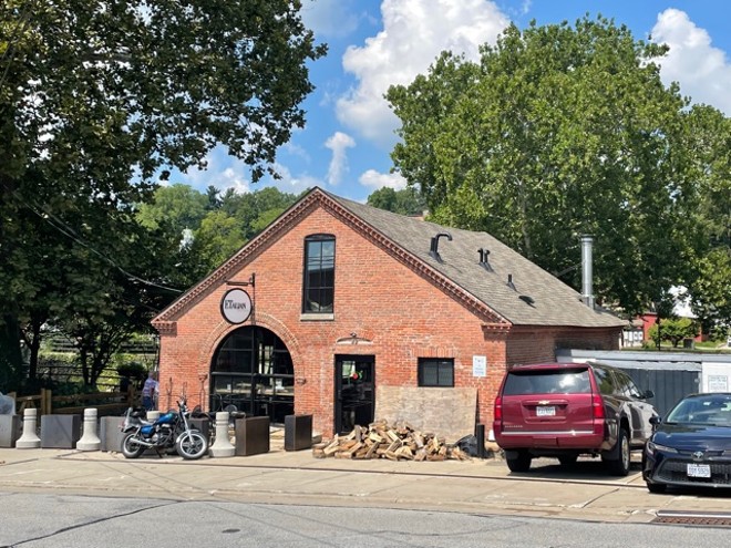 Formerly home to a blacksmith's shop, this building is now a wood-fired pizzeria. - Douglas Trattner