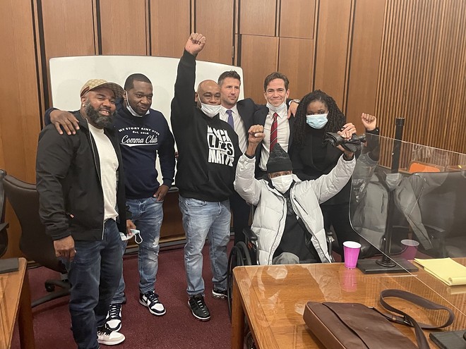 Isaiah (seated) is pictured with fellow exonerees Ru-El Sailor, Charles Jackson, and Laurise Glover, who served 15, 27.5, and 20 years respectively, for crimes they did not commit. - COURTESY FG+G
