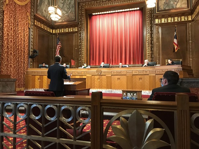 Attorney Phillip Strach speaks before the Ohio Supreme Court, arguing for the constitutionality of legislative district maps. The court heard arguments on three cases asking it to reject the maps approved in September. - Photo by Susan Tebben