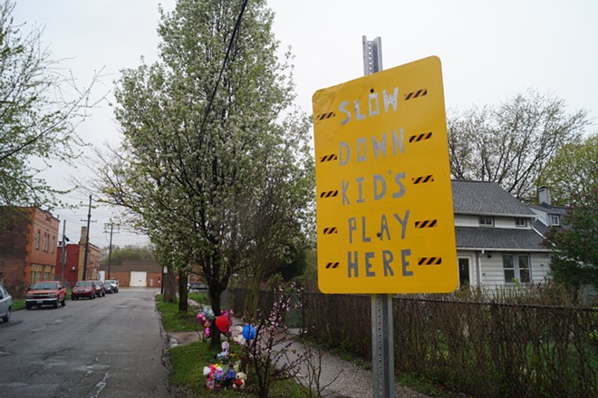Handmade sign urging motorists to slow down on W. 50th street in Cleveland's Clark-Fulton neighborhood. - Sam Allard / Scene
