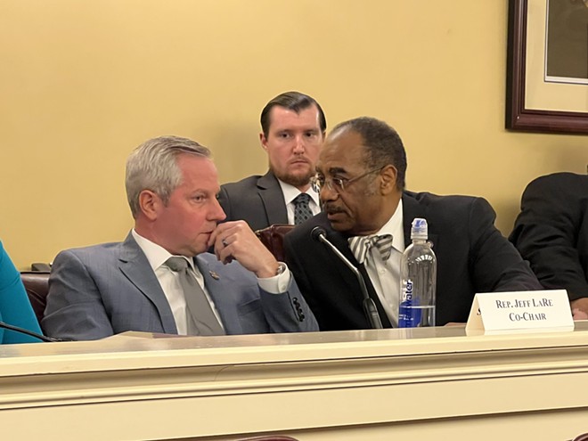 State Rep. Jeff LaRe and state Sen. Vernon Sykes talk during Thursday’s meeting of the Ohio Redistricting Commission. - (PHOTO: SUSAN TEBBEN, OCJ)