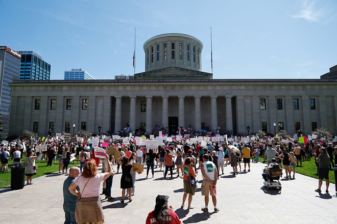 COLUMBUS, OH — MAY 14: Hundreds gather at a rally to support abortion rights less than two weeks after a leaked Supreme Court draft opinion showed a likely reversal of Roe v. Wade, May 14, 2022, at the Ohio Statehouse, Columbus, Ohio. - (PHOTO BY GRAHAM STOKES FOR THE OHIO CAPITAL JOURNAL.)