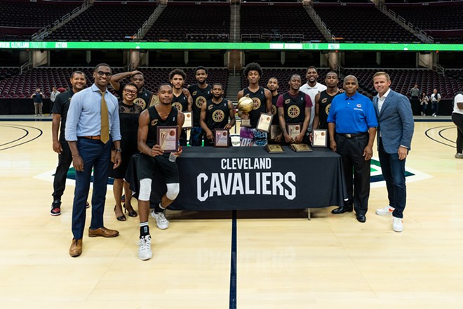 Members of the victorious Team 3 pose with their championship trophy alongside City of Cleveland and Cavs leaders. - Courtesy Cleveland Cavaliers