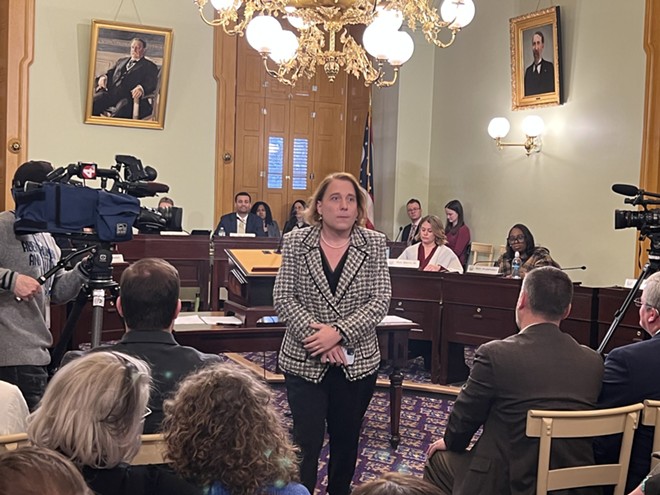 Amy Schneider, Dayton native and Jeopardy! champion, leaves the Ohio House Families, Aging and Human Services Committee after testifying against House Bill 454. Schneider, who is a trans woman, said the bill would be “tragic” for Ohio children. - Photo: Susan Tebben, OCJ