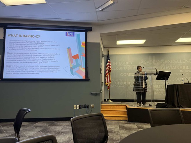 Marsha Mockabee, co-chair of the Racism as a Public Health Crisis Coalition (RAPHC-C), introduces the working group to the audience at the town hall update event on Friday, April 28 at the Tri-C’s Jerry Sue Thornton Center. - (Photo by Mandy Kraynak)