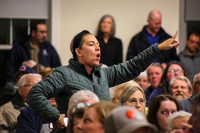 Many residents present had concerns about their family and their property. "I'm going to probably be putting a target on my back," one woman said. "But this is my backyard, and I can't have somebody come into my neighborhood who has connections to a variety of communities." - Mark Oprea
