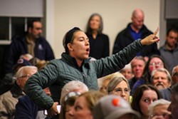 Many Munson residents were concerned at last week's town hall that the shelter would put their lives in danger. "I'm going to probably be putting a target on my back," one woman said. "But this is my backyard, and I can't have somebody come into my neighborhood who has connections to a variety of communities." - Mark Oprea