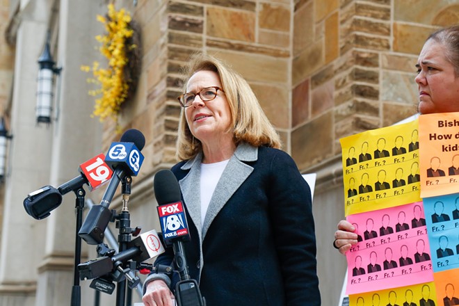 Anne Barrett Doyle, the co-director of Bishop Accountability, an anti-abuse non-profit, spoke near the steps of the Cathedral of St. John the Evangelist on Wednesday. - Mark Oprea