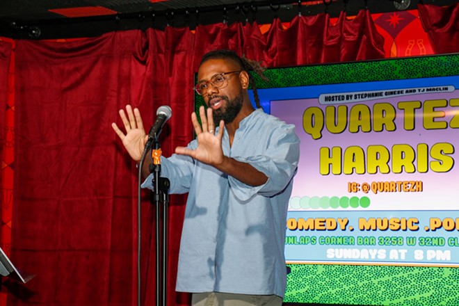 Harris reading at Dunlap's in April - Photo by Mark Oprea