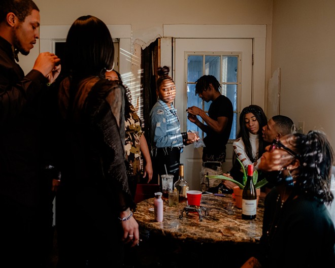 Vincent’s friends and family gather to celebrate his life in East Cleveland, a tiny, mostly Black suburb of Cleveland with a mostly White police force, after his funeral service on Jan. 23, 2021. - Michael Indriolo for The Marshall Project