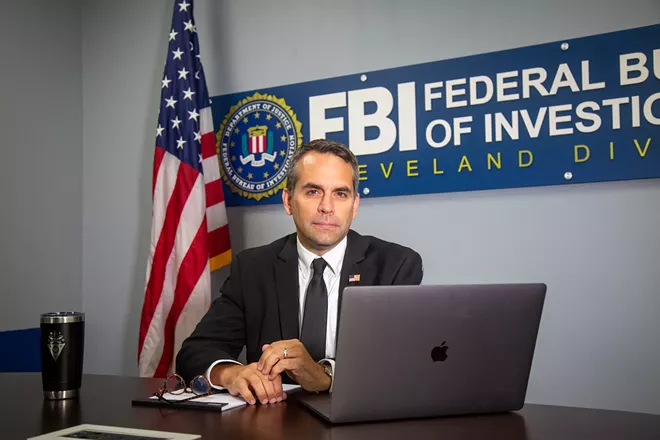 Agent Milan Kosanovich at his office - Mark Oprea