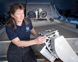 Diane Linne with a Percussive Excavation Bucket. - NASA