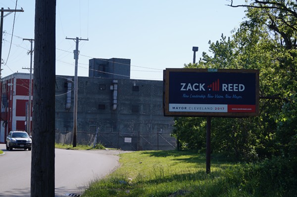 Reed has both sides of this billboard on Grand Ave., between E. 55th and Kinsman. (6/1/2017) - SAM ALLARD / SCENE