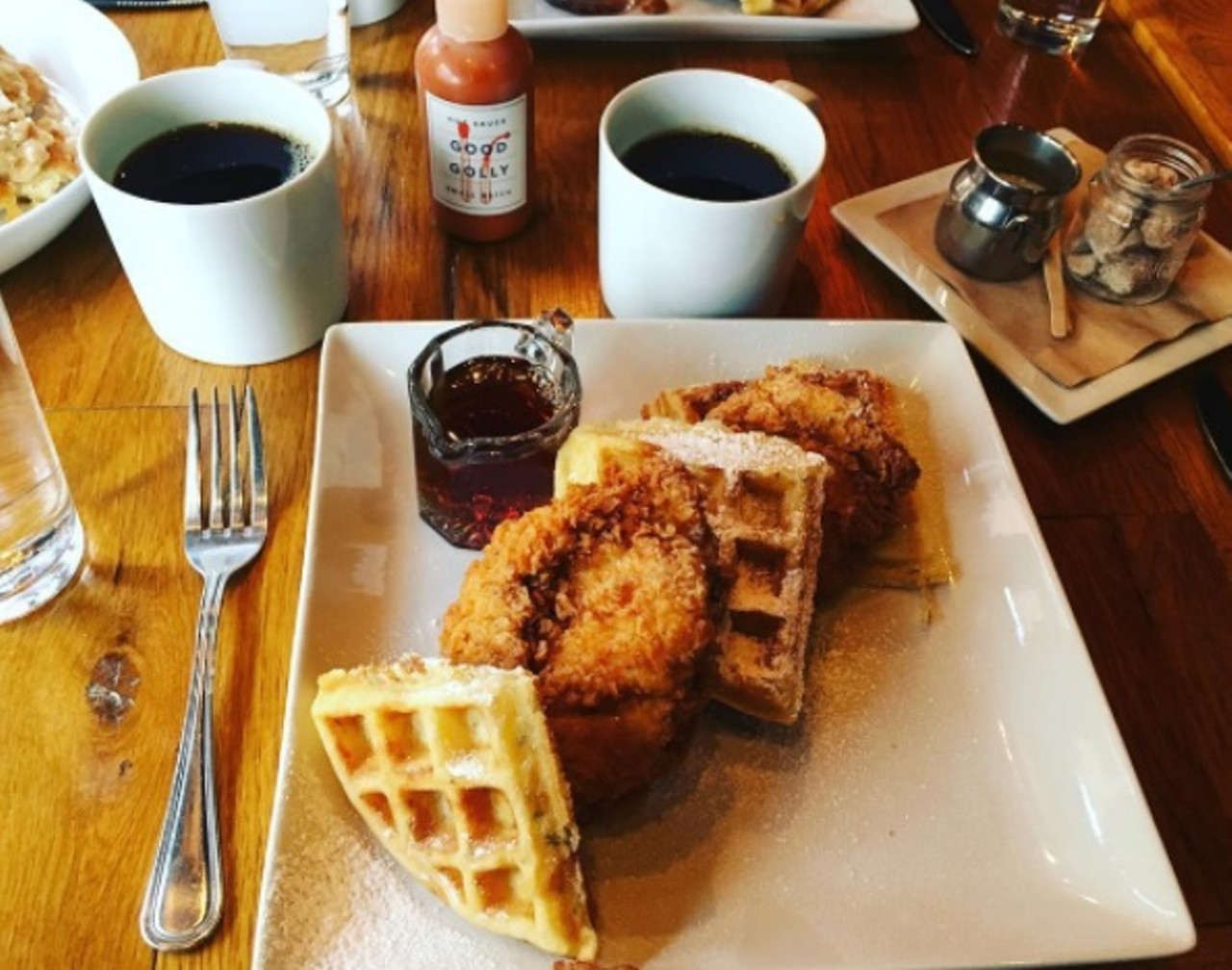 Fried Chicken and Waffles
at Soho Chicken + Whiskey
1889 West 25th St., Cleveland
If you want to eat the best chicken and waffles, you head straight to a Southern restaurant. Since opening, this Ohio City bistro has paired perfect fried chicken with heaven-scented waffles and some of the most addictive housemade hot sauce around to create a winner, winner chicken dinner.
Photo via Scene Archives