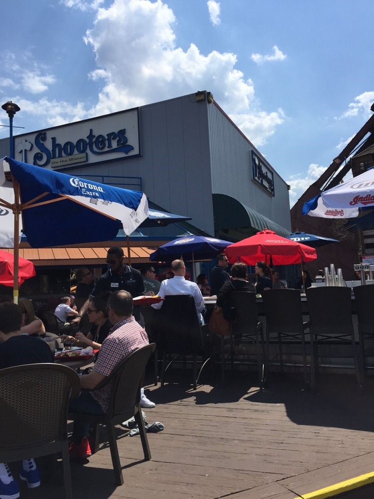 Shooters - 
1148 Main Avenue, Cleveland -
Happy hour: 3:30-6:30 M-F
Shooters has historically been a focal point for the Flats, I know my mom has told me stories of spending time there with friends in her twenties. There&#146;s an outdoor bar, plenty of patio seating, and endless Instagram-worthy picture spots. Right off RTA stop, providing easy access and views of trains, bridges, ships at harbor. If that&#146;s not enough to convince you, the $5 cocktails and $5.50 appetizers might just do the trick.
http://www.shootersflats.com/
