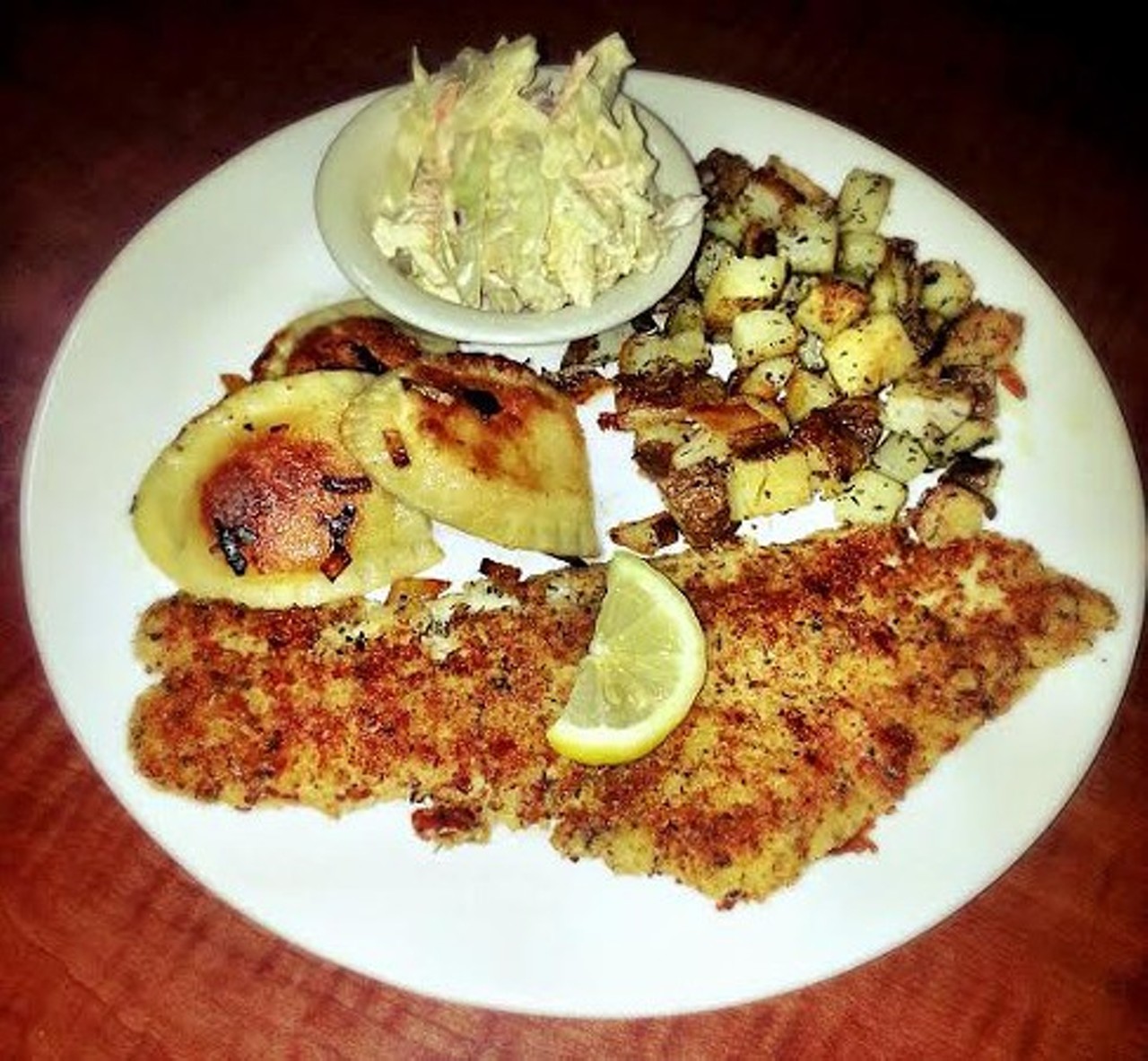 Grumpy's Cafe - The Anti-Fish Fry: no fryers needed here. Grumpy's serves up a lightly breaded and grilled haddock along with herb roasted potatoes, and Southwest slaw. Add pierogies for $2 more. Served every Friday through Lent. Stop in at 2621 W 14th St.