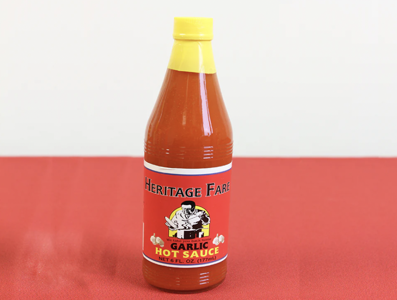 Heritage Fare Garlic Hot Sauce Once you try this Cleveland-based company's Heritage Fare Garlic Hot Sauce, you'll wonder how you ever managed without it.  So will your host.