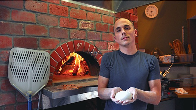 Marc-Aurele Buholzer in the kitchen of Vero, his wood-burning pizza shop in Cleveland Heights.