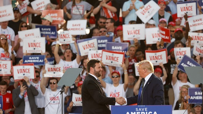 COLUMBUS, OH — APRIL 23: Former President Donald J. Trump shakes hands with U.S. Senate candidate J.D. Vance at the Save America Rally, April 23, 2022, at the Delaware County Fairgrounds, Delaware, Ohio.